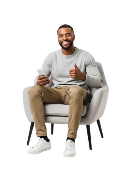 Man sitting on chair using phone